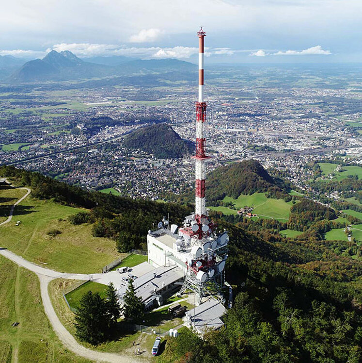 Transmitter mast on Gaisberg with city of Salzburg